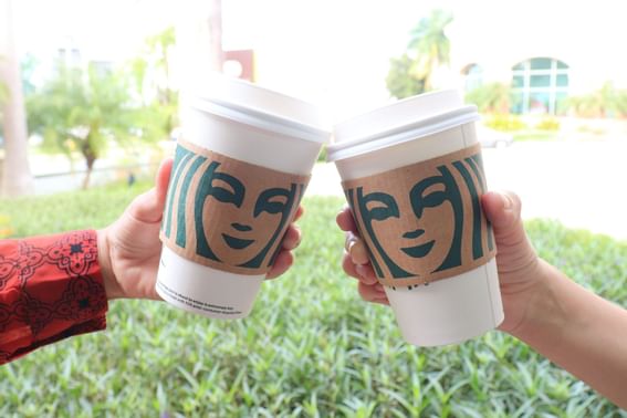 two Starbucks coffee cups