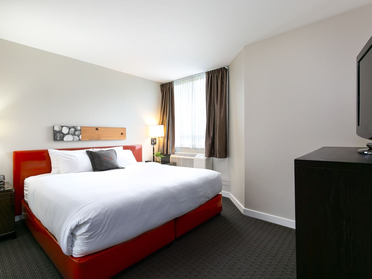 Hotel room with one bed.