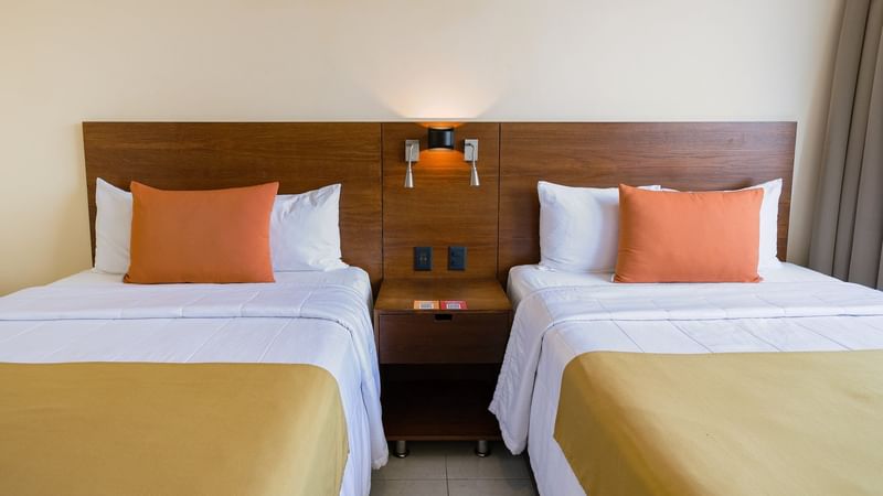 Twin beds in Superior double room at Gamma Hotels