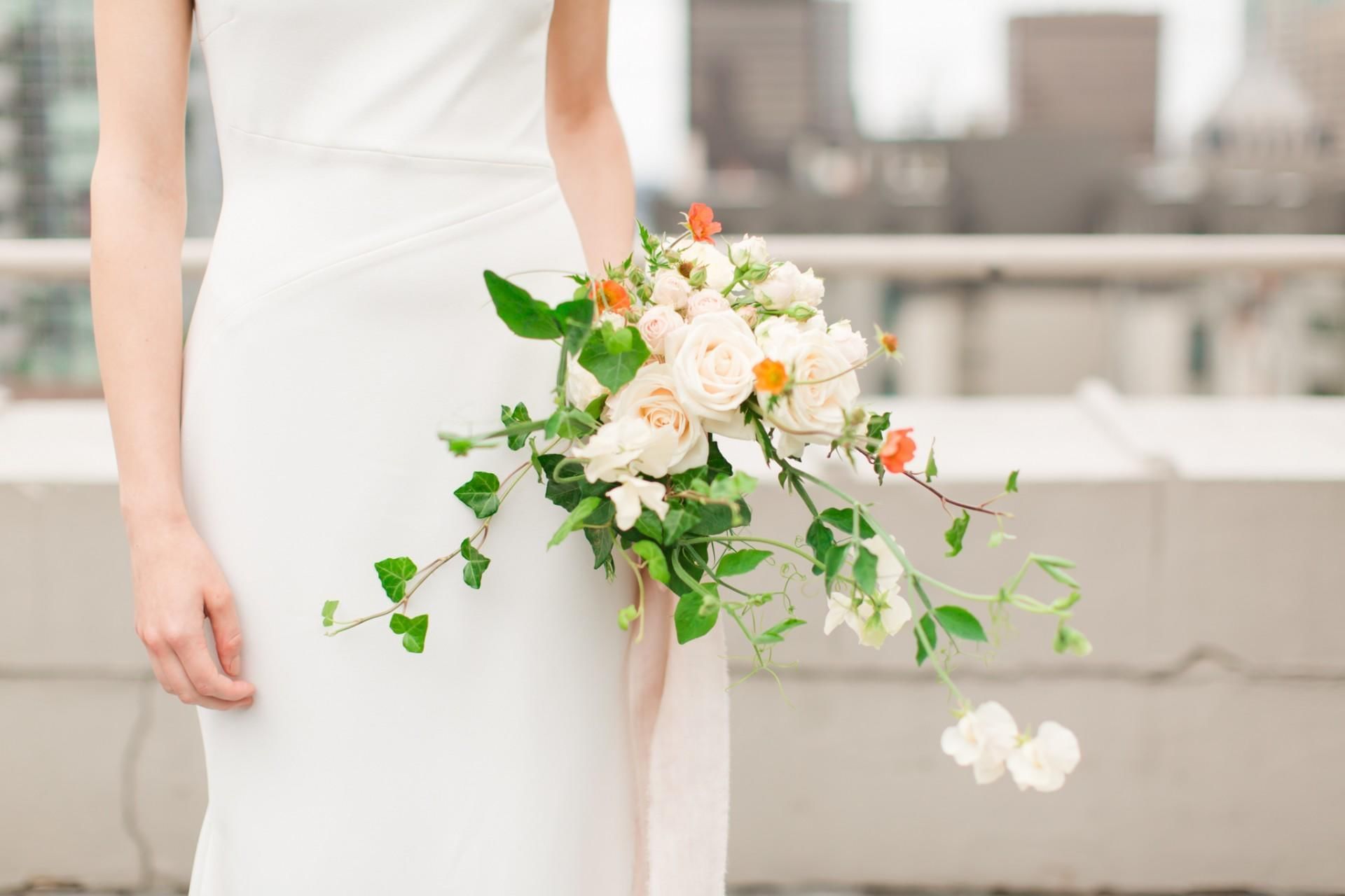 Close up of a bride holding a bouquet at Hotel Sorrento