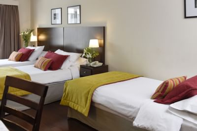 Dormitorio en Junior Suite Triple
en Argenta Suites Belgrano