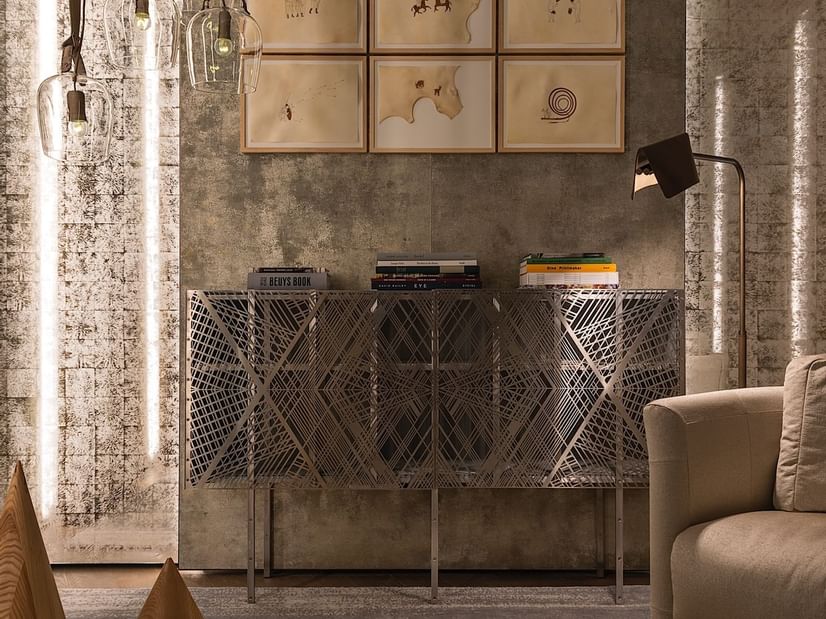 Shelf with books in a meeting room at Fendi Private Suites