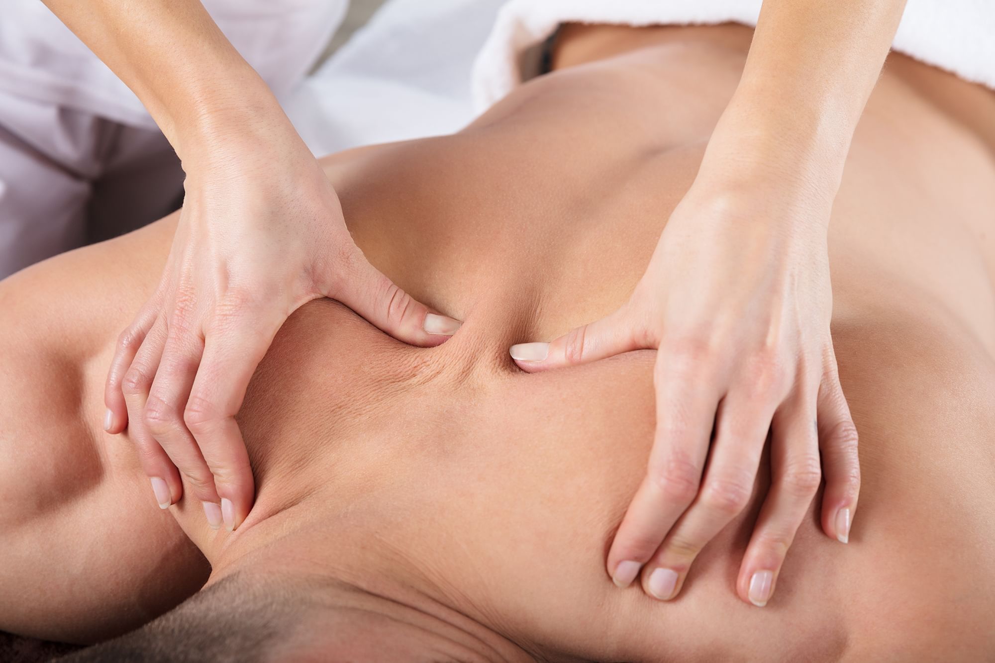 Person receiving a Le Spa massage at The Spa by Warwick Melrose