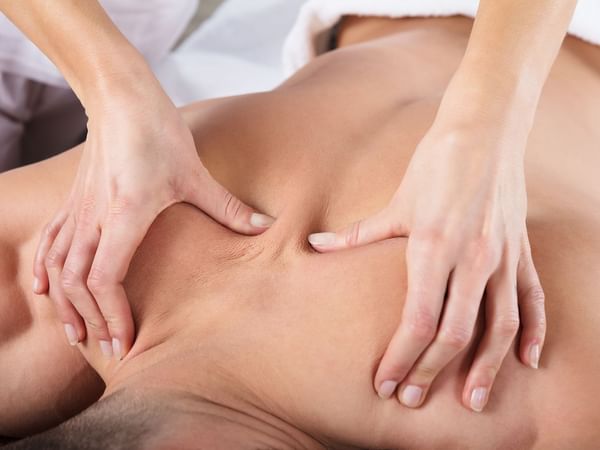Back massage provided at Le Spa by Warwick Melrose Dallas