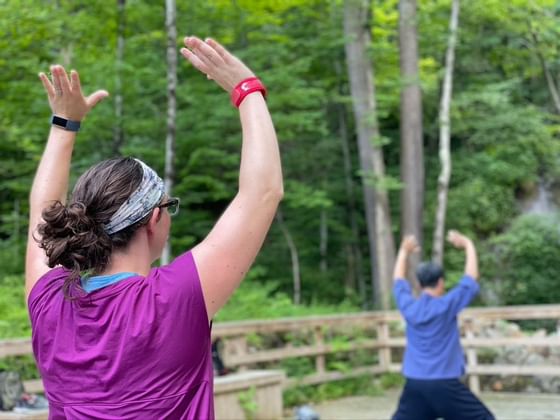 People doing healing Qi-gong in a park near Honor’s Haven Retreat