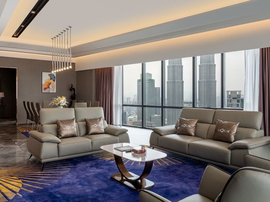 Cozy sofa in living room area of Presidential Pool Suite at Imperial Lexis Kuala Lumpur