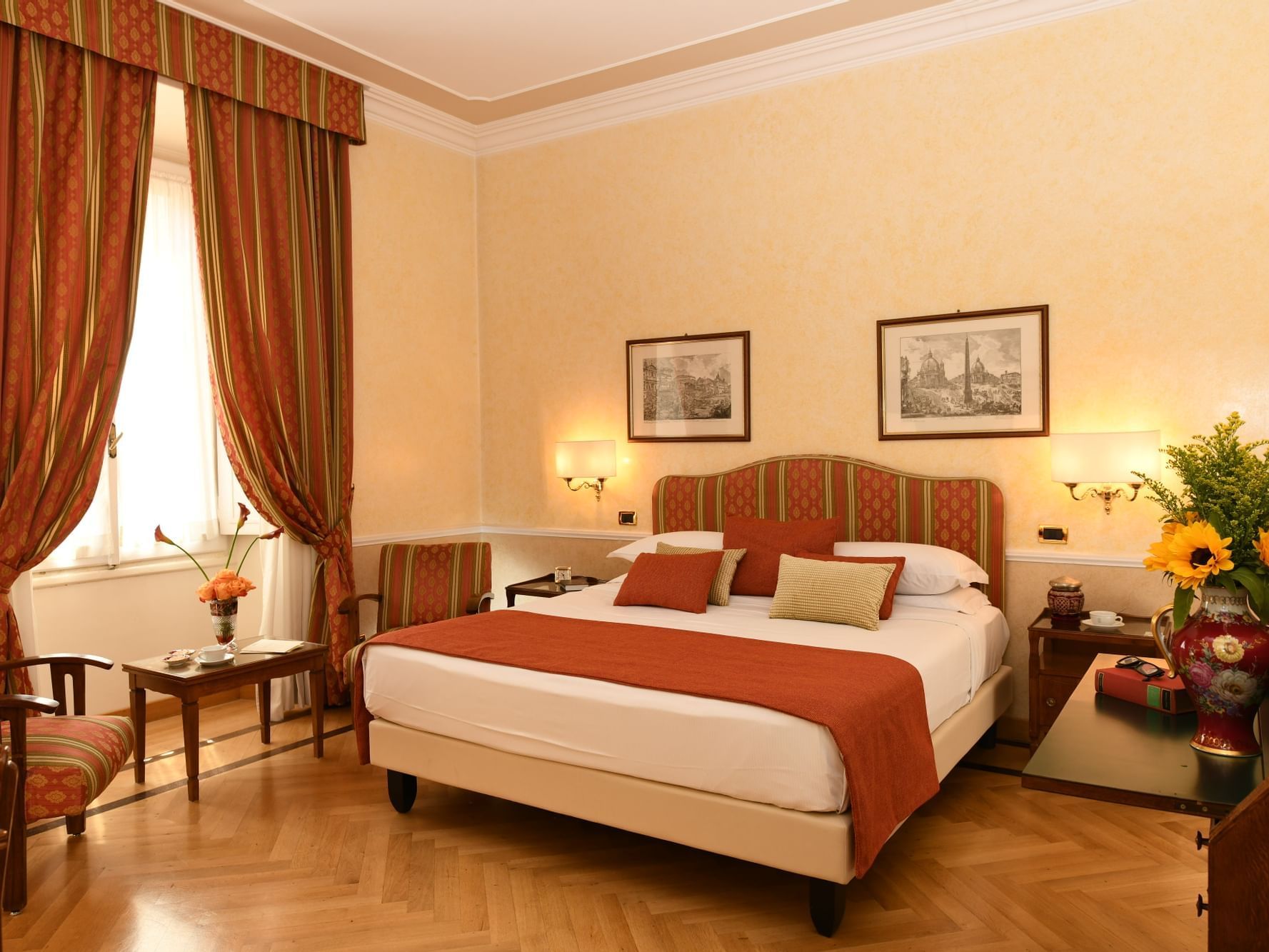 King bed, fresh flowers & lounge in Superior Room at Bettoja Hotel Massimo D´Azeglio