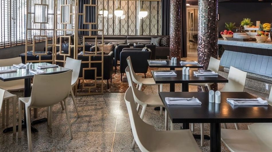 Dining area in Lapidus Restaurant at Capitol Skyline Hotel