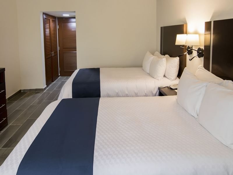 Two large beds in Superior Double Room at Gamma Hotels