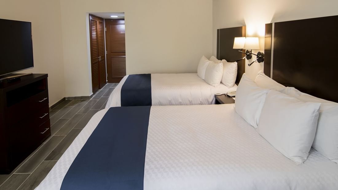 Two large beds in Superior Double Room at Gamma Hotels