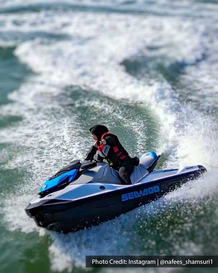 A person riding a jet ski in the Port Dickson sea - Lexis Port Dickson