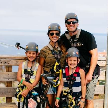 Family in zip line costume posing for a photo at Catalina Island Company