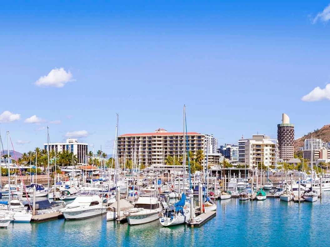 Boats & yachts stationed by the dock near Grand Chancellor Townsville