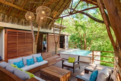 Luxury living area in Two Bedroom Villas With Private Pool and jungle views at Morgan’s Rock Reserve & Ecolodge