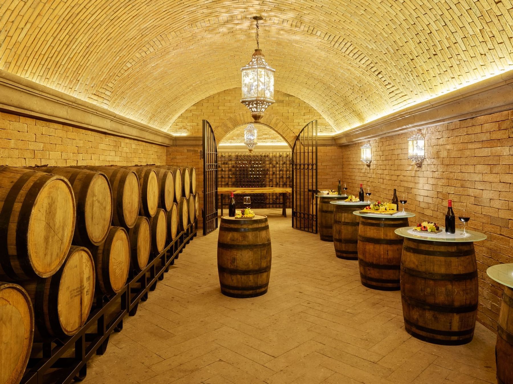 Barrels placed in a wine cellar at La Colección Resorts