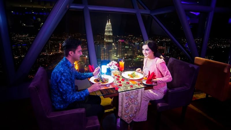 A couple on a romantic dinner at KL Tower near Sunway Lagoon