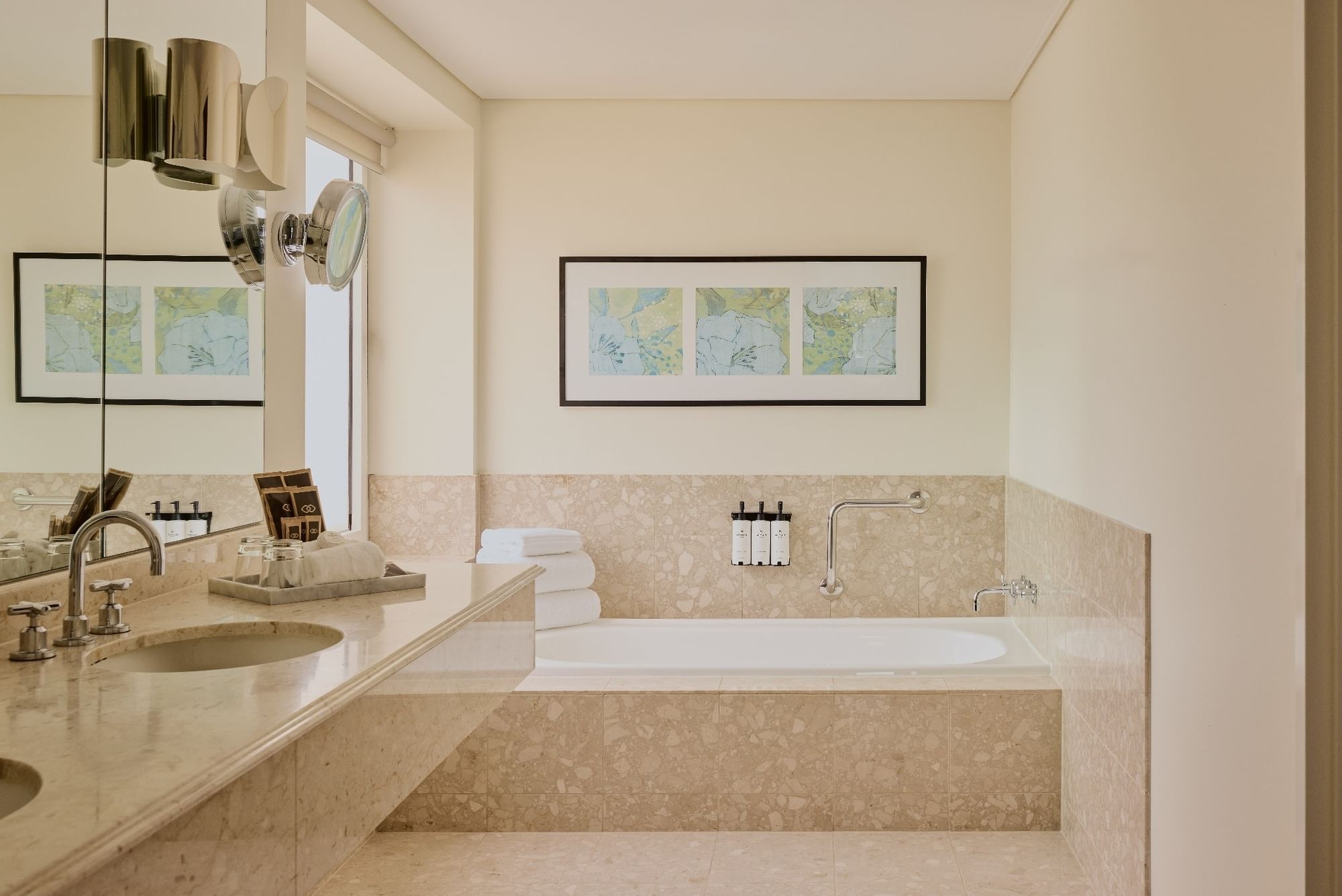 Interior of Junior Suite Bathroom  with mirror & stylish fittings at Sofitel Brisbane Central