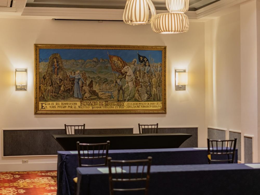 Old picture hanging on a wall in Monterrey Room at Gamma Hotels