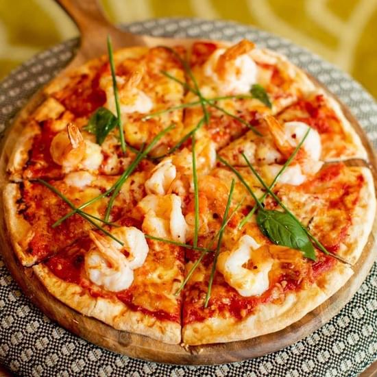 Seafood pizza served in Shallows Bar at Pullman Magenta Shores