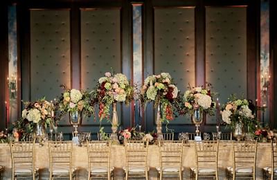 Flower decor of the head table of a wedding at Stein Eriksen Lodge