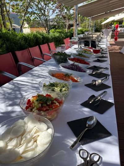 Outdoor buffet table with a variety of salads at Starling Hotels in Lausanne Switzerland