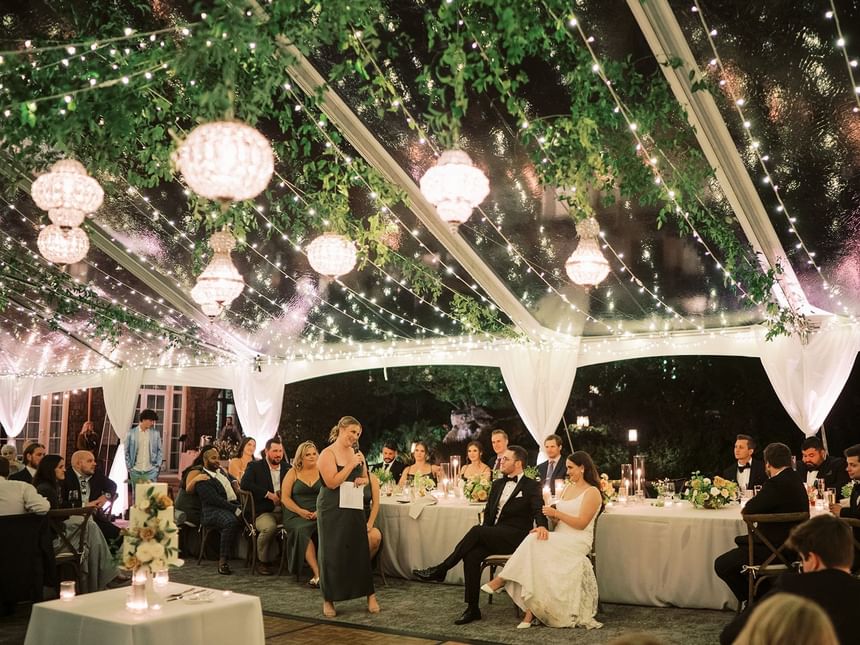 Wedding reception under tent with lights at Alderbrook Resort & Spa
