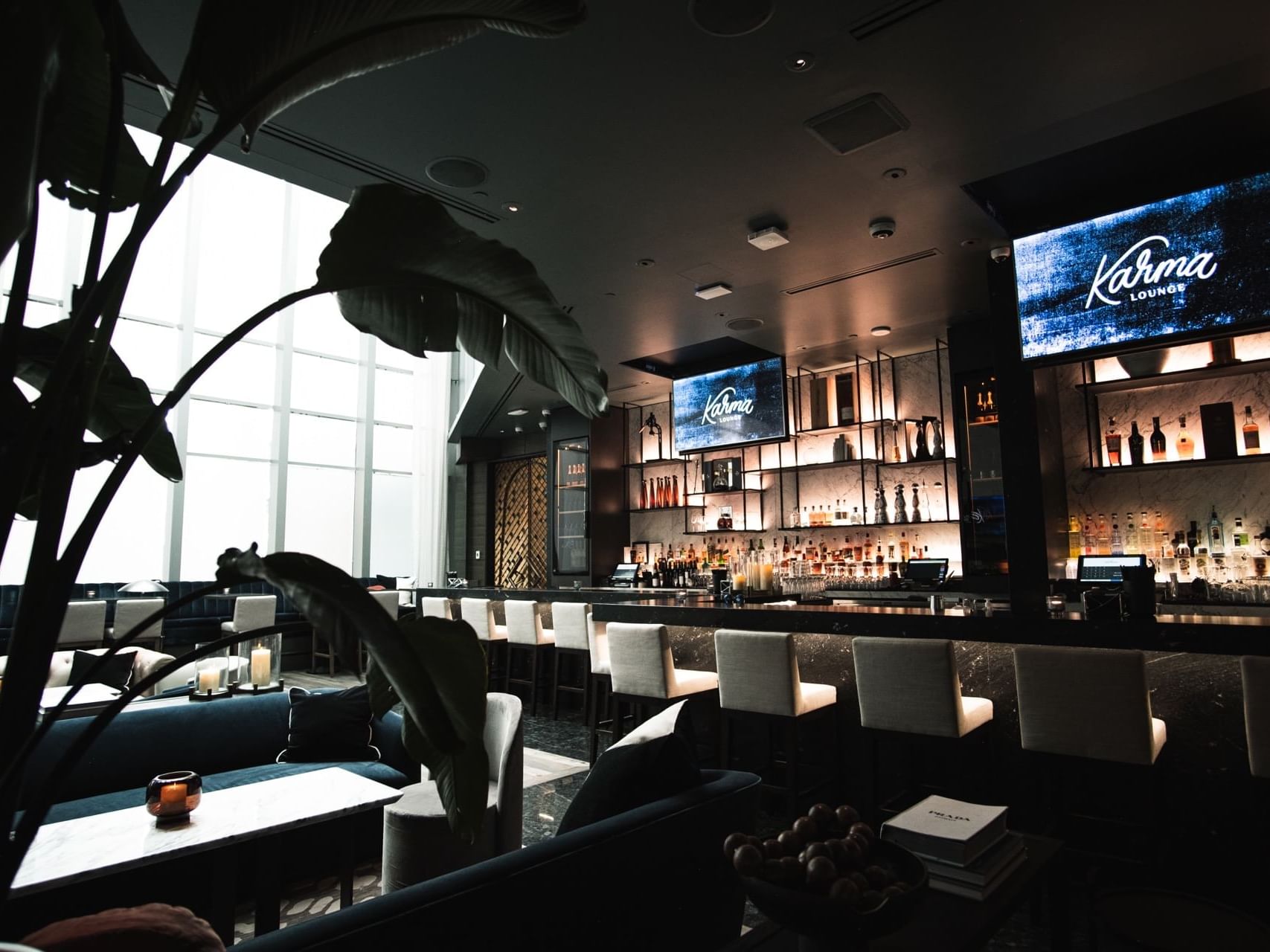 Moody High End Bar and Lounge with full floor to ceiling windows.