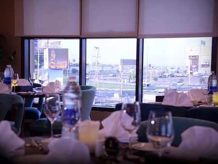 Close-up of table setup in Al Multaqa Restaurant at Warwick Al Khobar