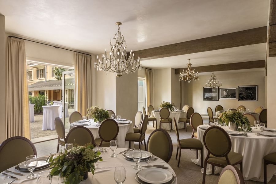 The Bluebonnet Room at Granduca Houston, one of the elegant Houston wedding venues, with chandeliers and courtyard views