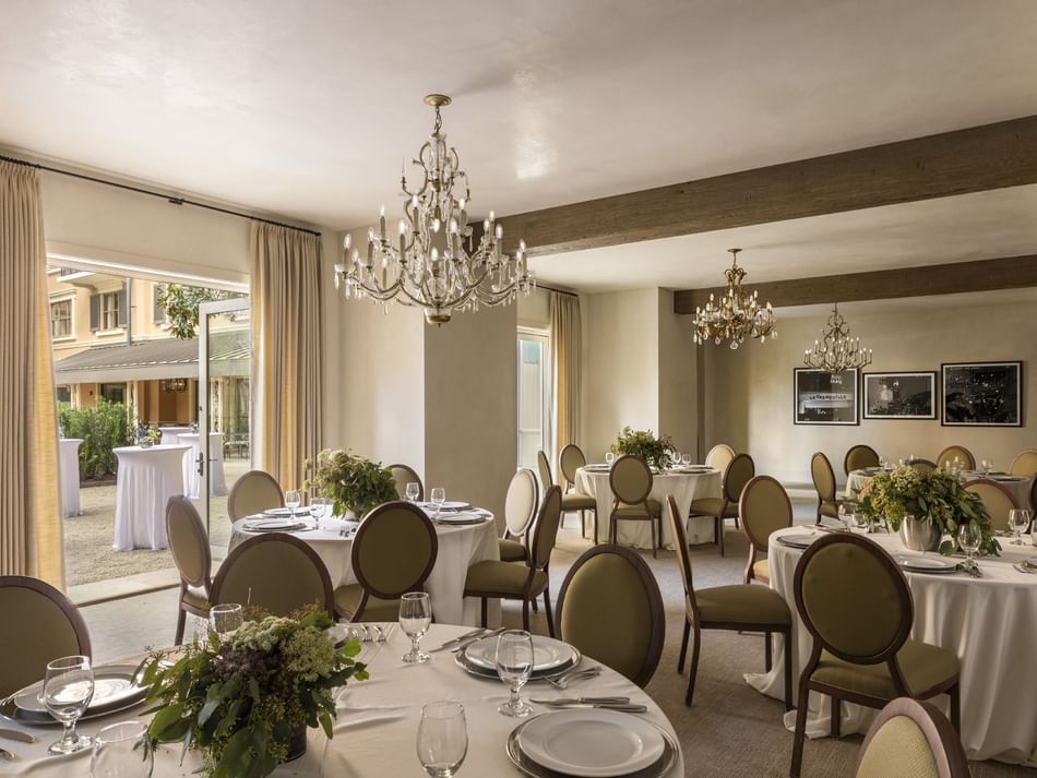 The Bluebonnet Room at Granduca Houston, one of the elegant Houston wedding venues, with chandeliers and courtyard views