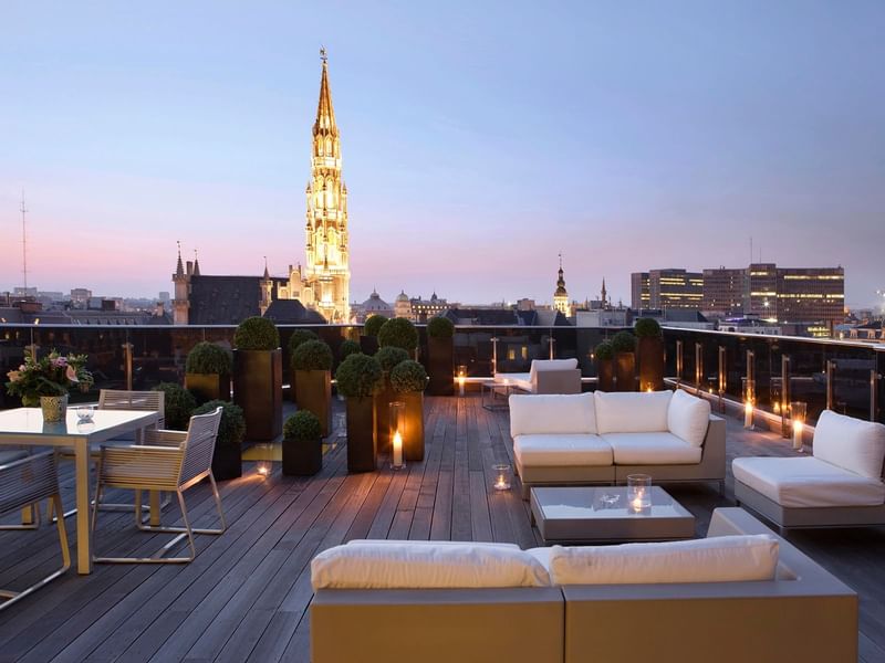 Secret Rooftop Bar with the view of Grand Place at night in Warwick Brussels