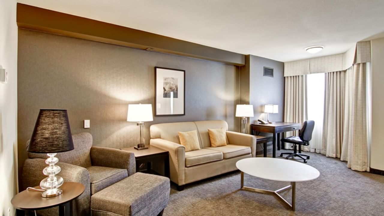 Sofa and desk in hotel living room