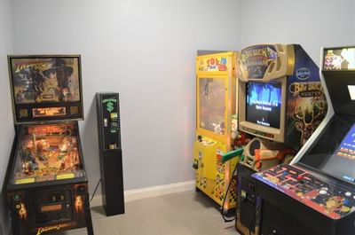 Video Games & Pinball Machine in Game Room