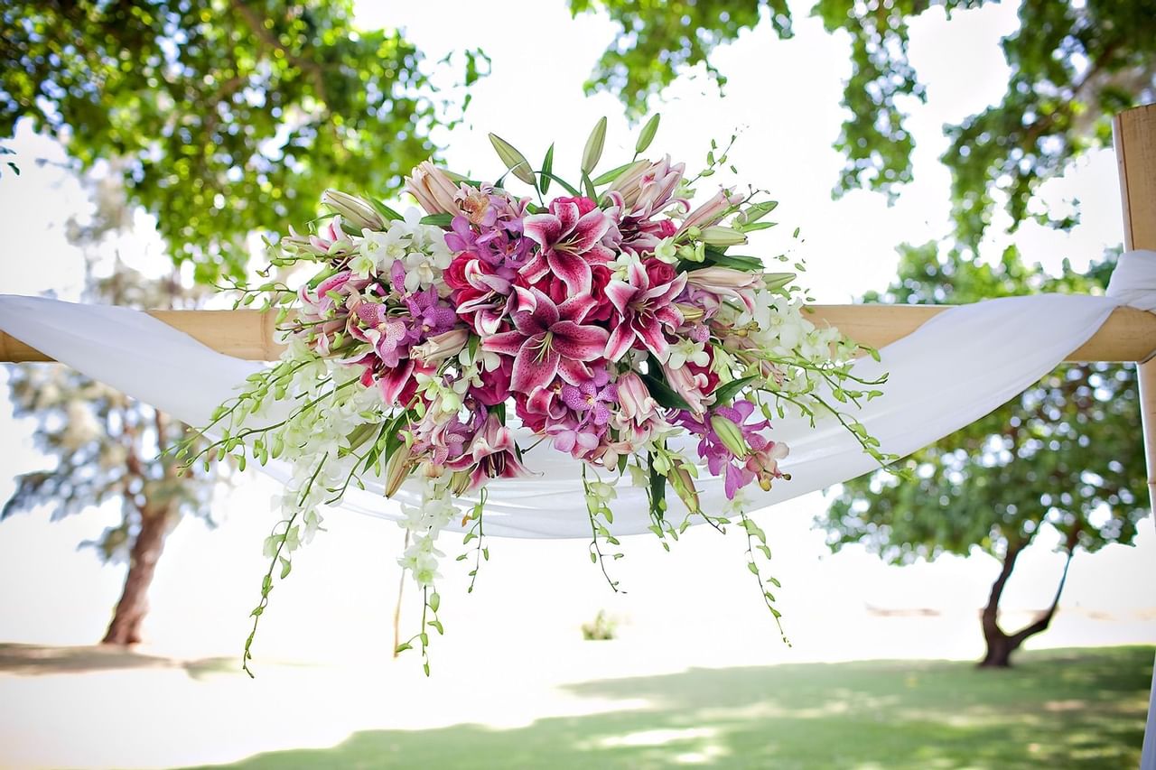 Hammock with a wedding bouquet at Waimea Plantation Cottages