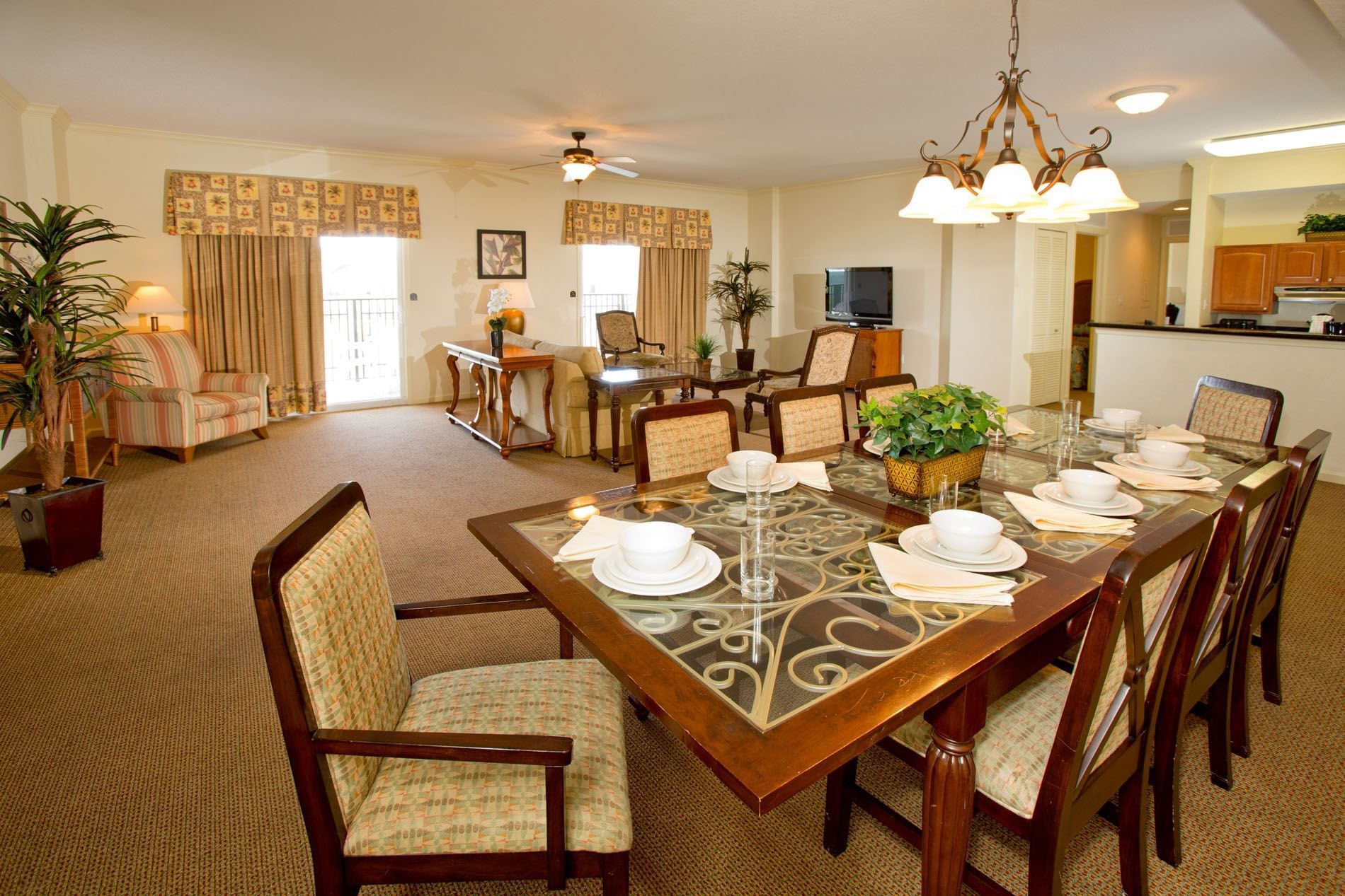 Living area with dining table in 4-Bedroom 4-Bath Large Suite at Lake Buena Vista Resort Village & Spa