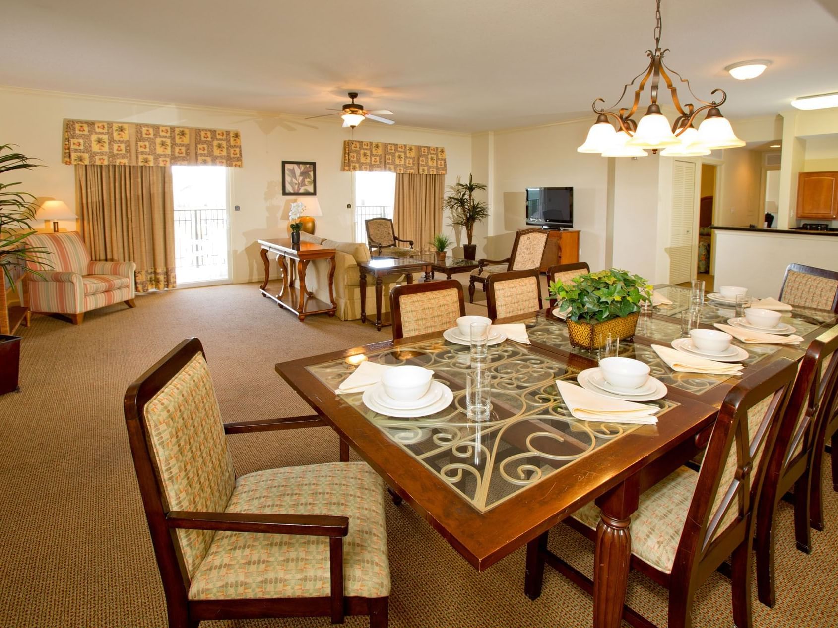 Living area with dining table in 4-Bedroom 4-Bath Large Suite at Lake Buena Vista Resort Village & Spa