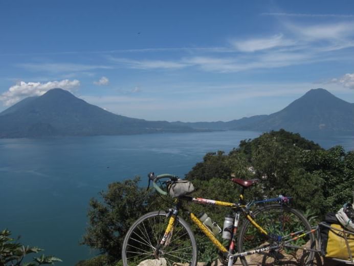 Bicycle parked on a mountain range overlooking the sea near Regis Hotel & Spa