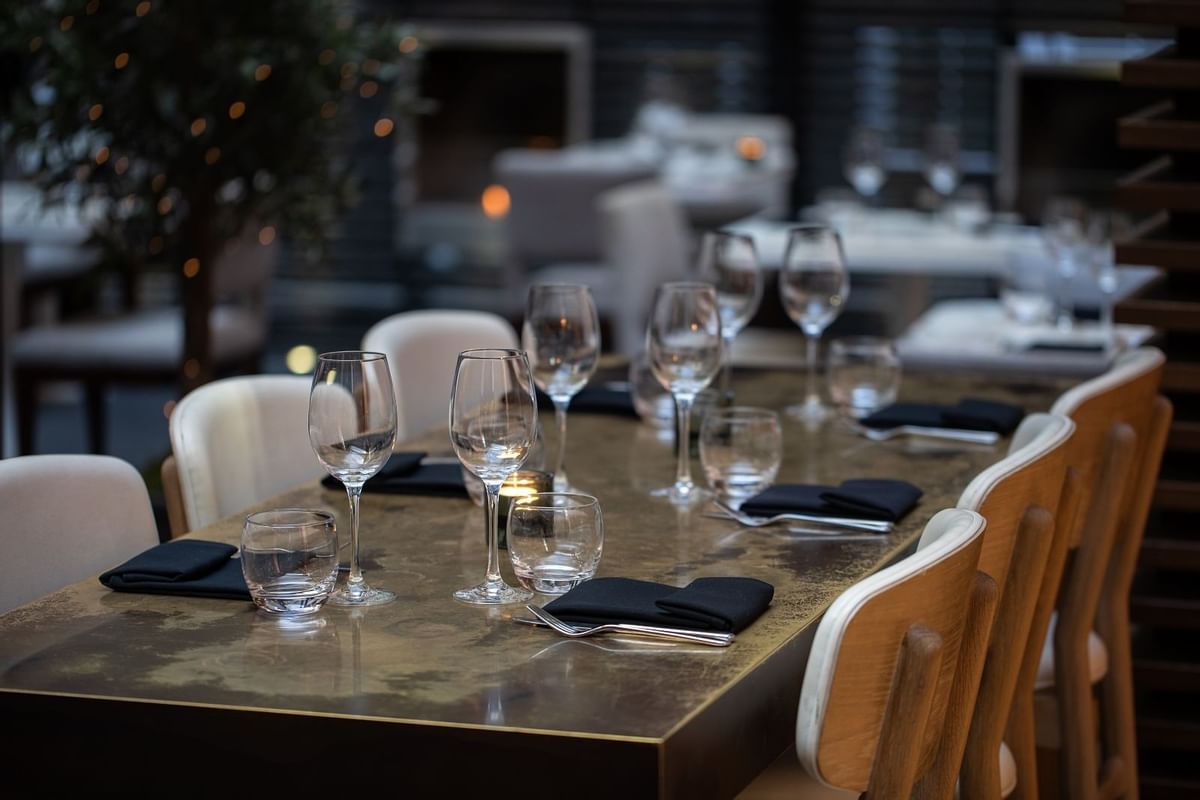 Glasses on table in Kitchen Terrace at May Fair Hotel London