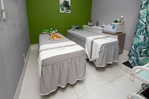 Massage beds and amenities arranged in the Spa at Playa Blanca Beach Resort