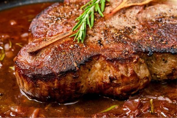 Red wine jus sauce on steak one of the most traditional steak sauces