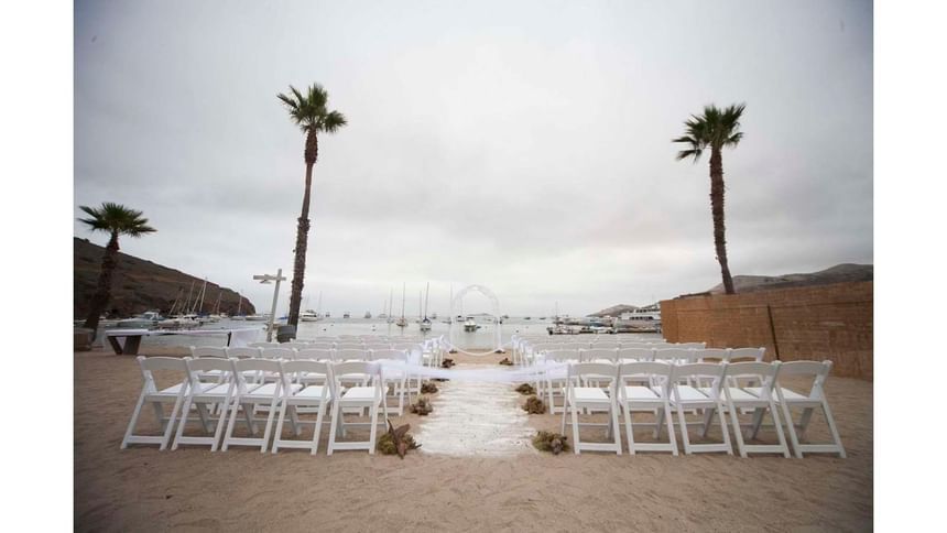 Outdoor wedding ceremony arranged with a ocean backdrop at Catalina Island Company