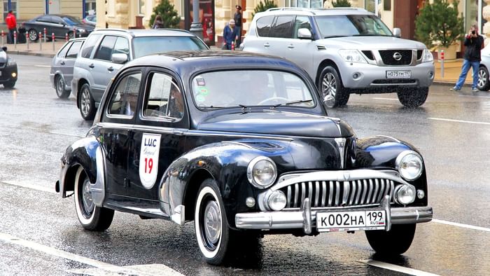 Peugeot 203 car by Peugeot Museum near Originals Hotels