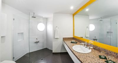 Bathroom with vanity & shower area in Terrace Suite at Le Manoir Bogotá Hotel