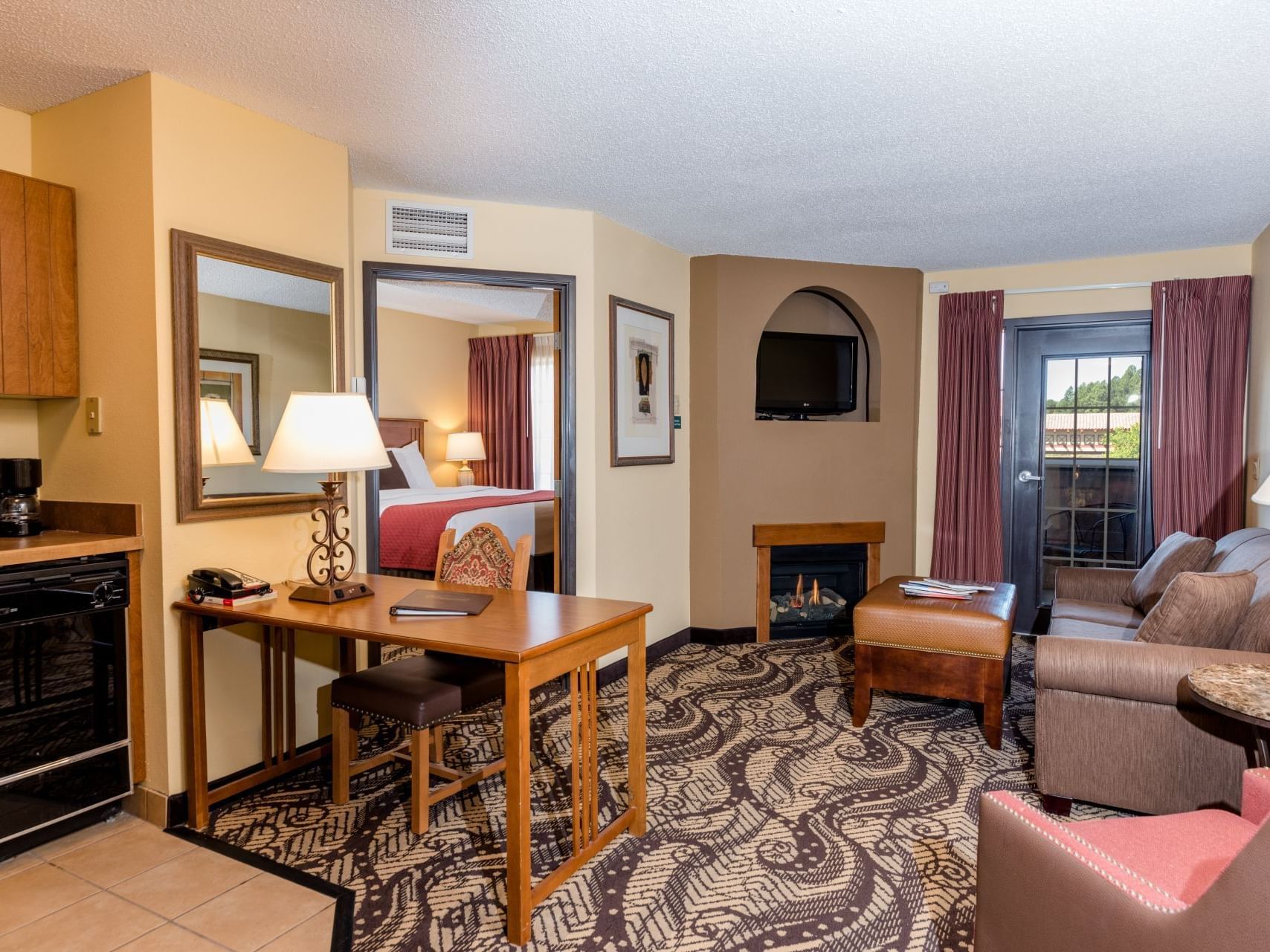 One Bedroom King Suite living area at Elegante Lodge & Resort