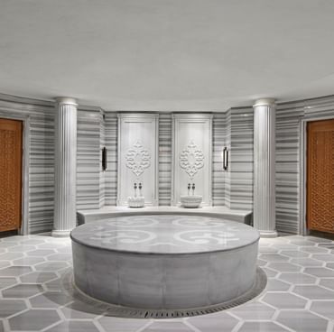 Turkish Bath area with marble columns and arches in Oriental Hammam at Titanic Chaussee Berlin