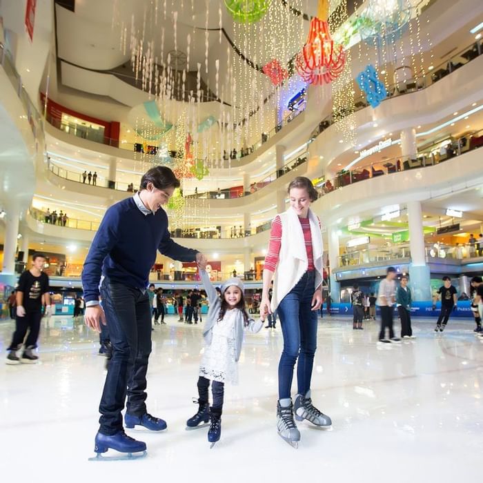 A family while ice skating at Sunway Pyramid near Sunway Lagoon
