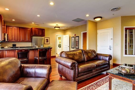 Living space and kitchenette
of Presidential Suite at The Wildwood Hotel