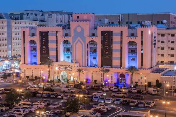 Exterior view of the Mena Hotel Andalusia Building at night