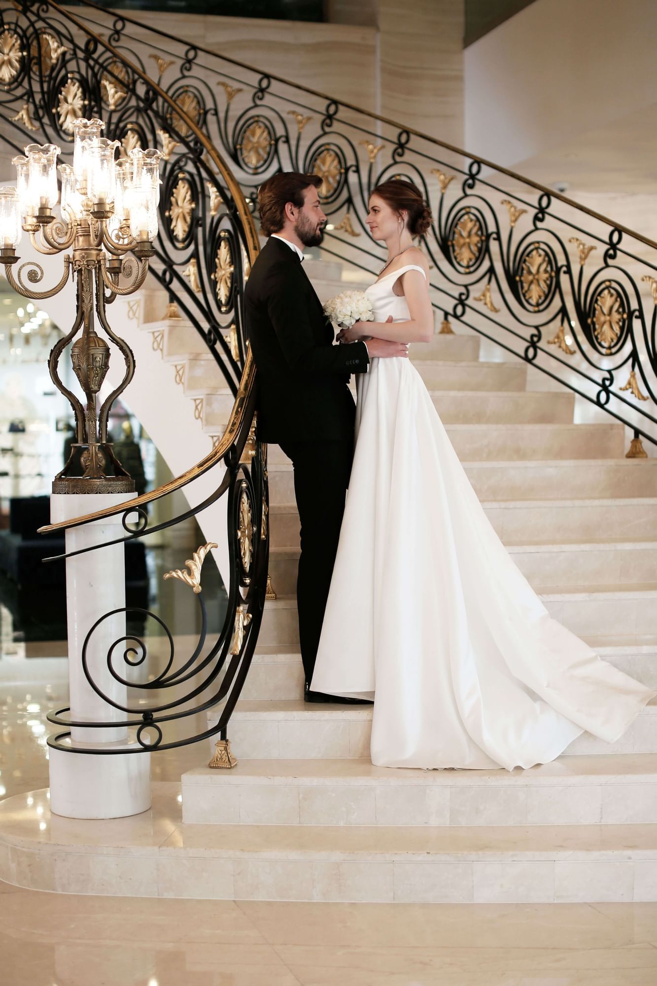 Wedding couple on a stair at CVK Park Bosphorus Hotel