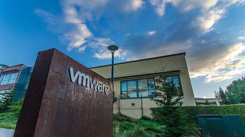 The VMware company sign and building under a dramatic sky near El Prado Hotel
